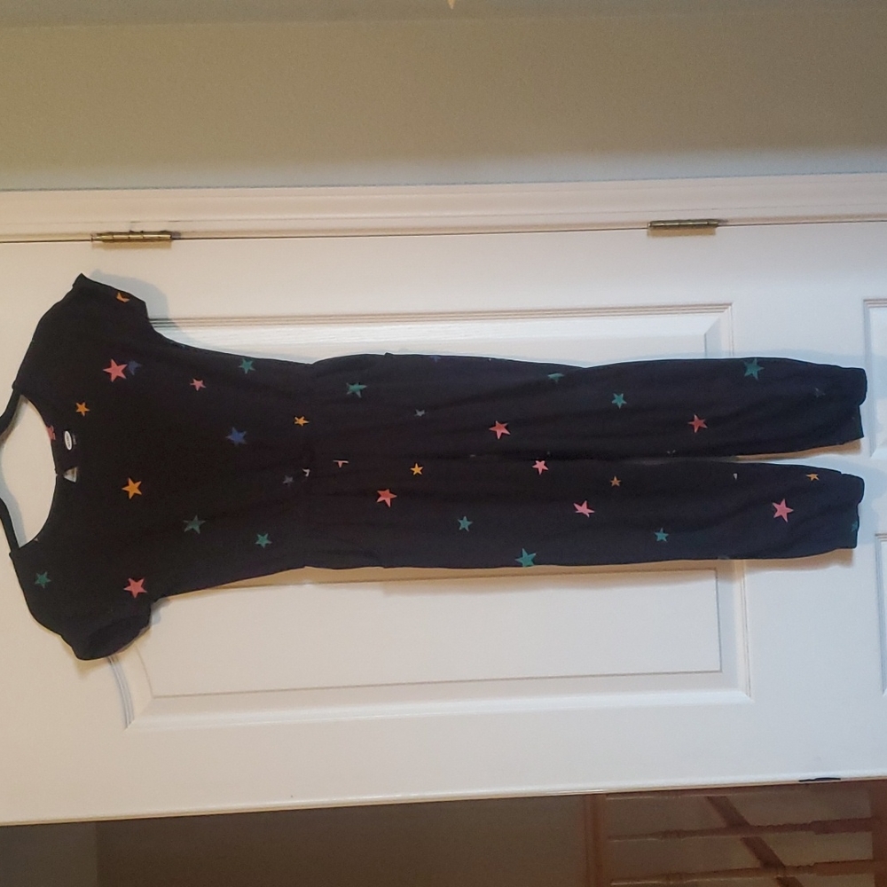Girl's Old Navy Romper. Size 10/12. Black with multi-color stars.